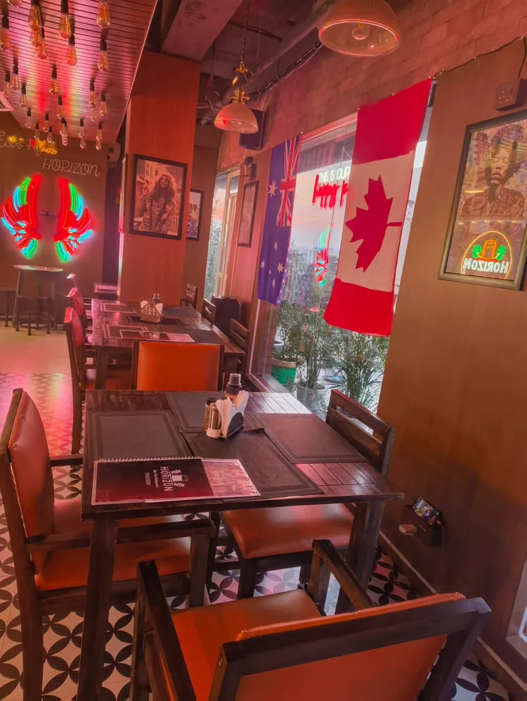 A decorated dining row set up for a group dinner