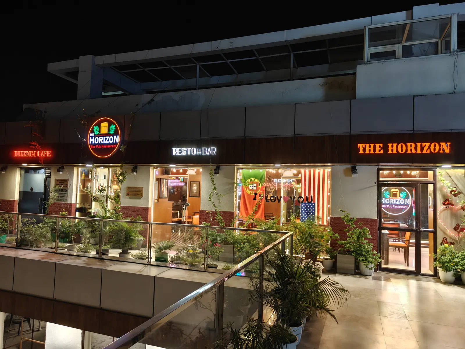 The restaurant facade glowing at night
